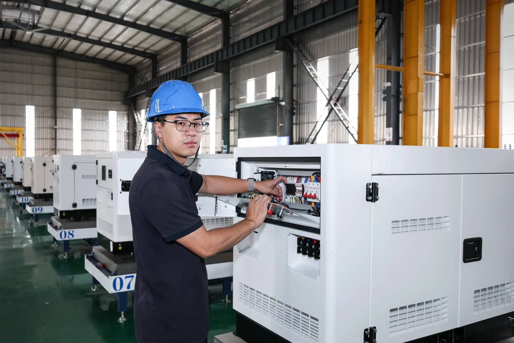 Chief Engineer Ning Wenjun inspecting a DAF POWER generator